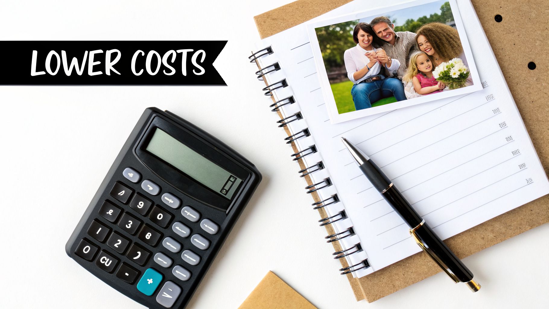 A calculator, notebook, pen, and family photo symbolize lower costs and financial planning.
