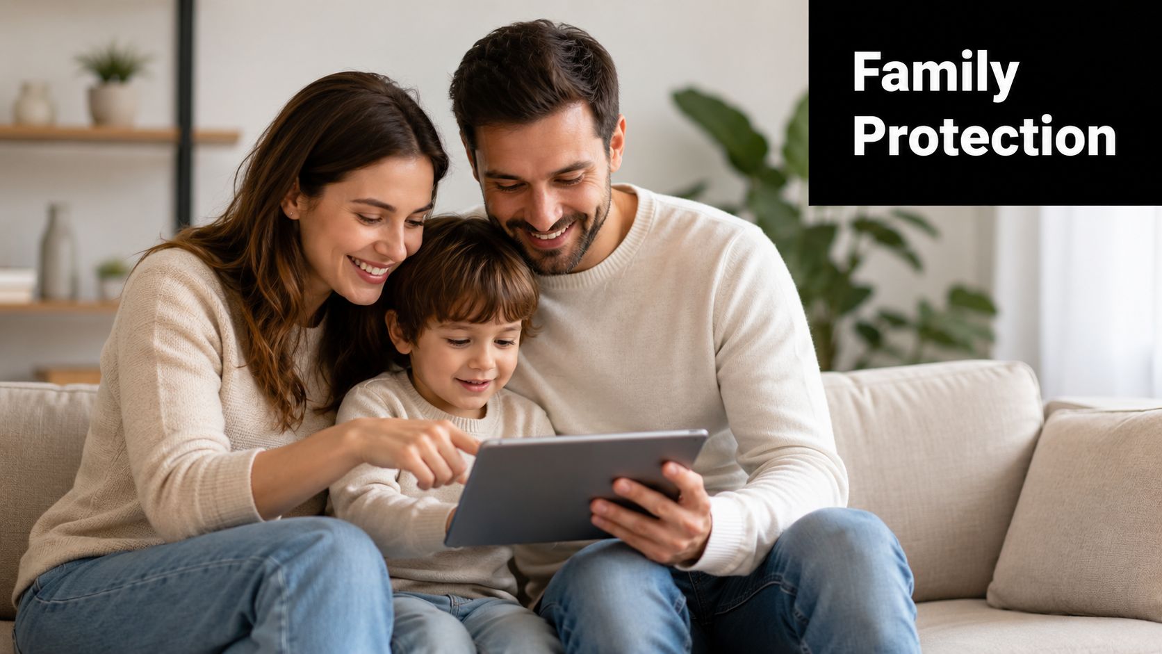 A smiling family consisting of a mother, father, and young son sitting on a sofa using a tablet.